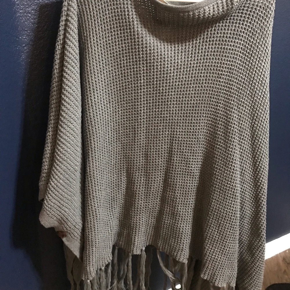 Gray poncho style top. Never worn. Still has tags